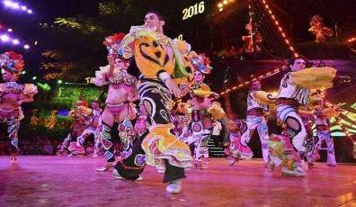 The dancers and their colorful costumes.